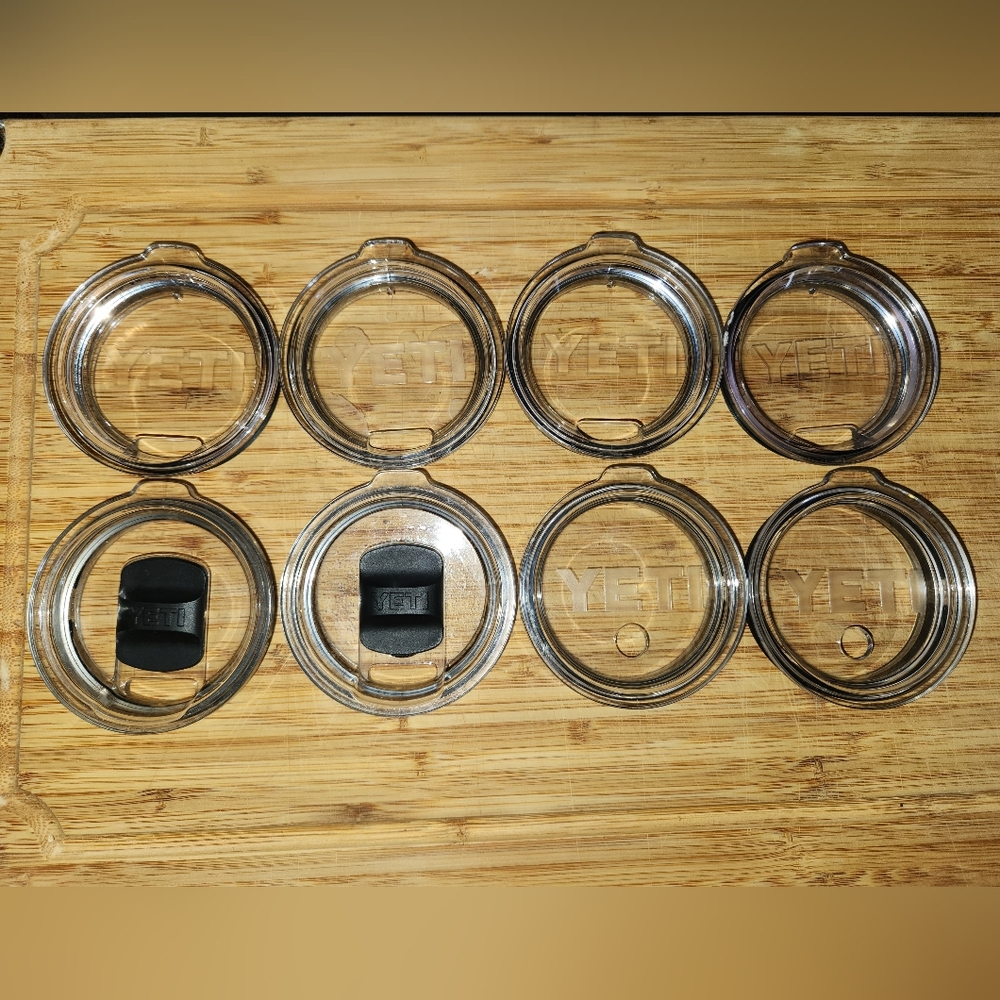 8 Yeti medium Yeti lids. SELLING TOGETHER AS A PACKAGE.